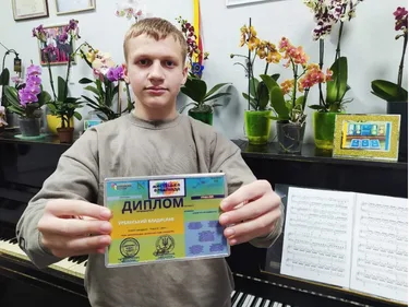 Учасник конкурсу з нагородою
